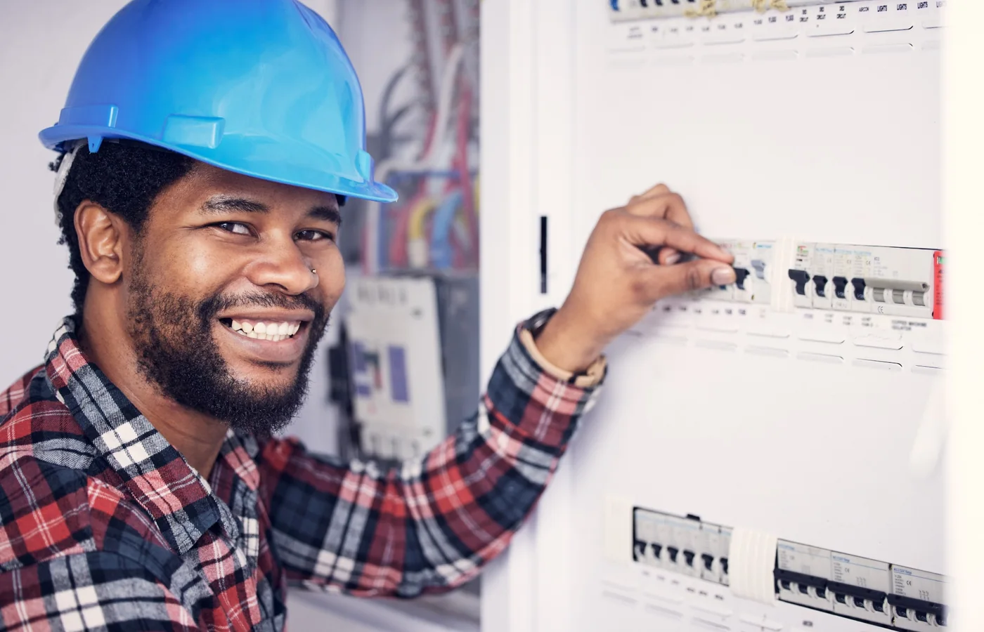 Electrician working on electrical services in Gauteng