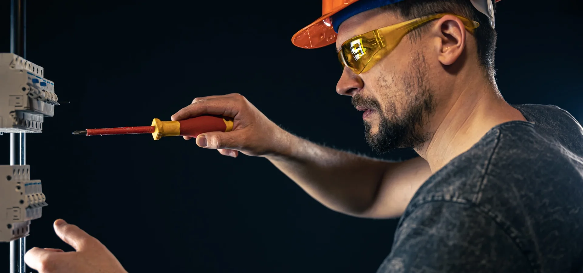 Electrical company in Gauteng planning and completing electrical work Electrician working on electrical switchgear during a planned electrical installation
