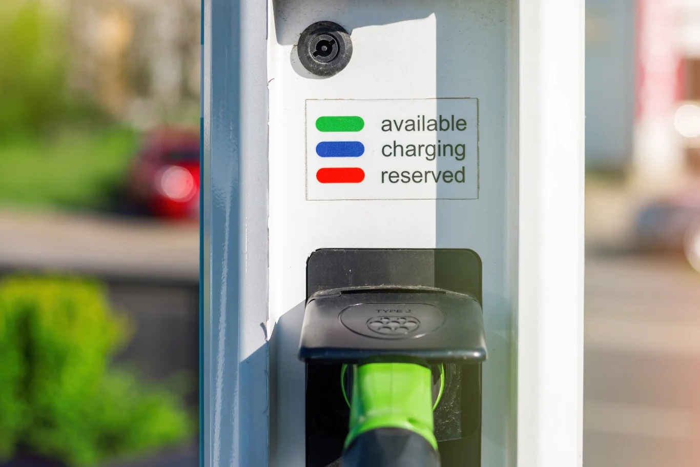 Commercial electric vehicle charging station with charging connectors