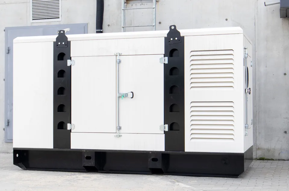 Mobile generator positioned for temporary backup power at a commercial facility Mobile generator positioned for temporary backup power at a commercial facility
