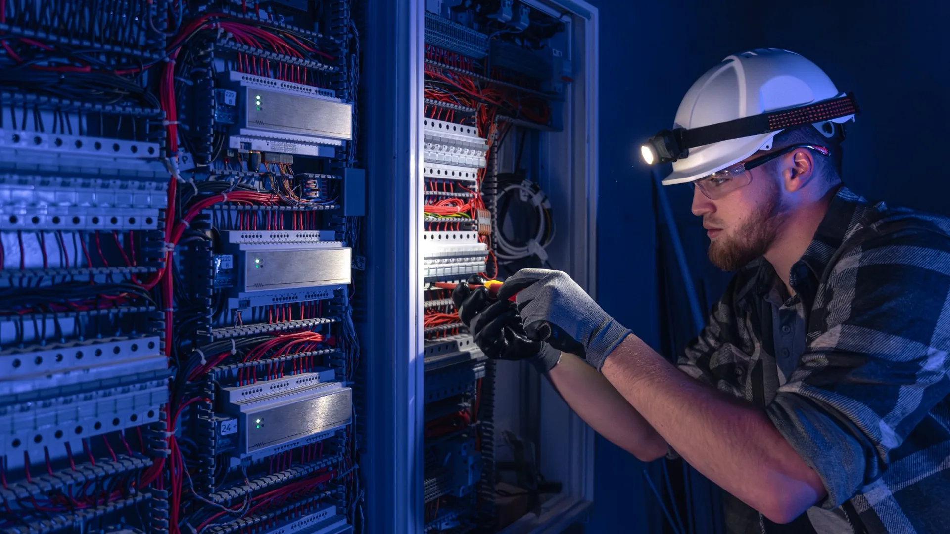 Electrician near me in Gauteng working on an electrical switchboard
