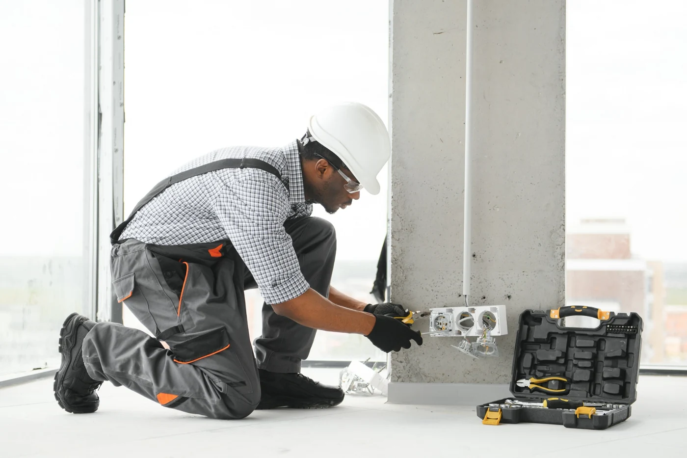 Electrician installing commercial plug points at a property in Gauteng