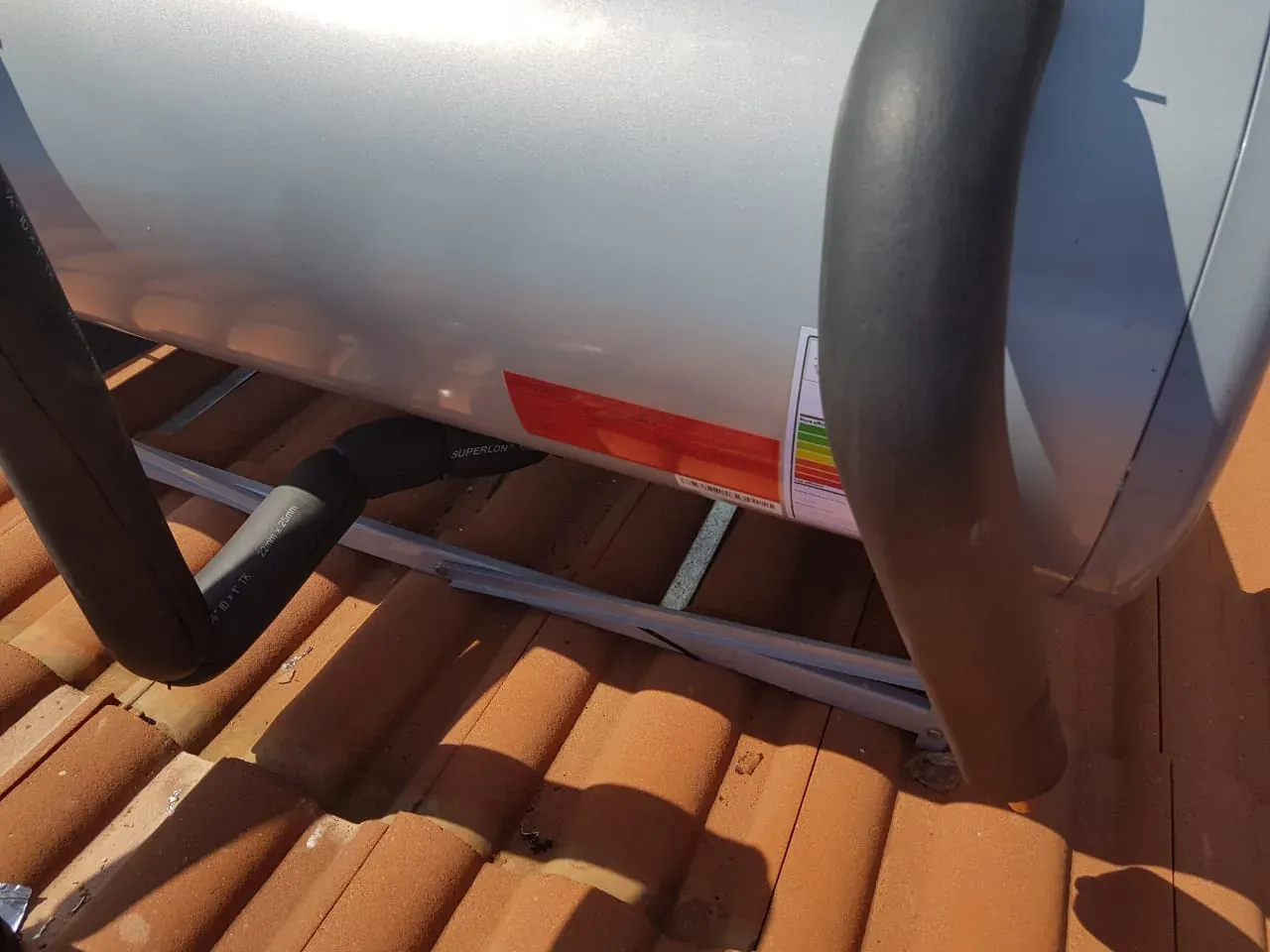 100 Litre Evacuated Tube Solar Geyser Conversion – Professional Solar Geyser Conversion Process professionally insulated solar geyser pipework on a 100 litre conversion installation