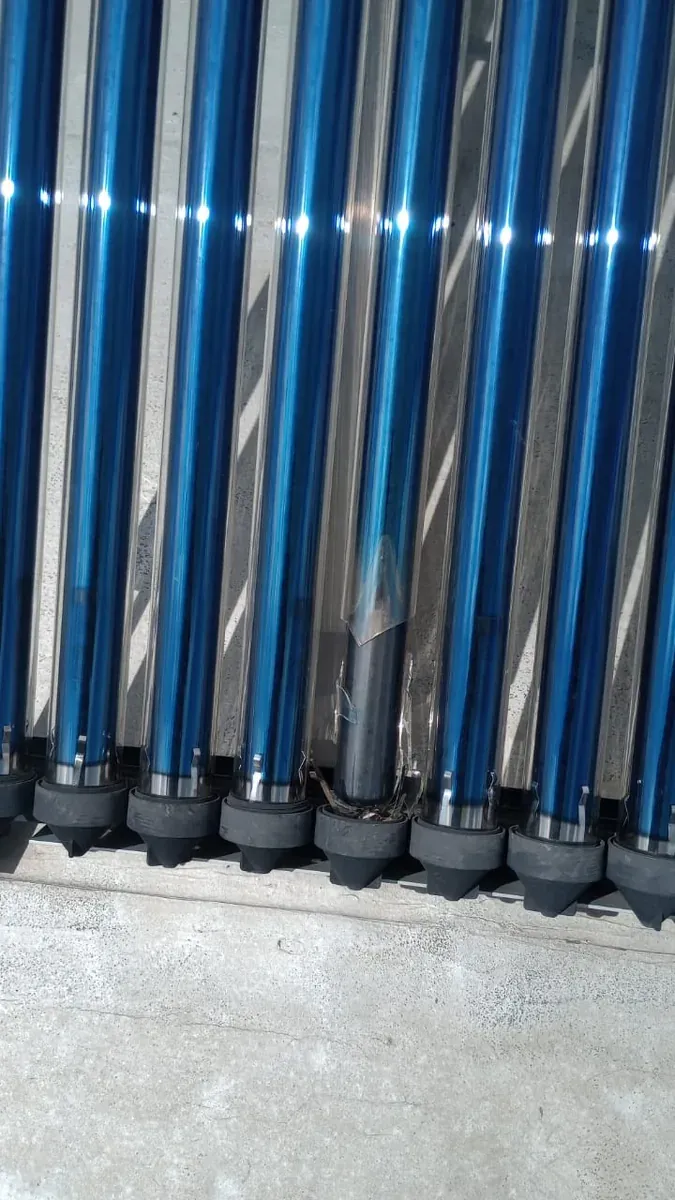 100 Litre Evacuated Tube Solar Geyser Conversion – Frequently Asked Questions About 100 Litre Solar Geyser Conversions solar geyser technician assessing an evacuated tube installation for a 100 litre conversion