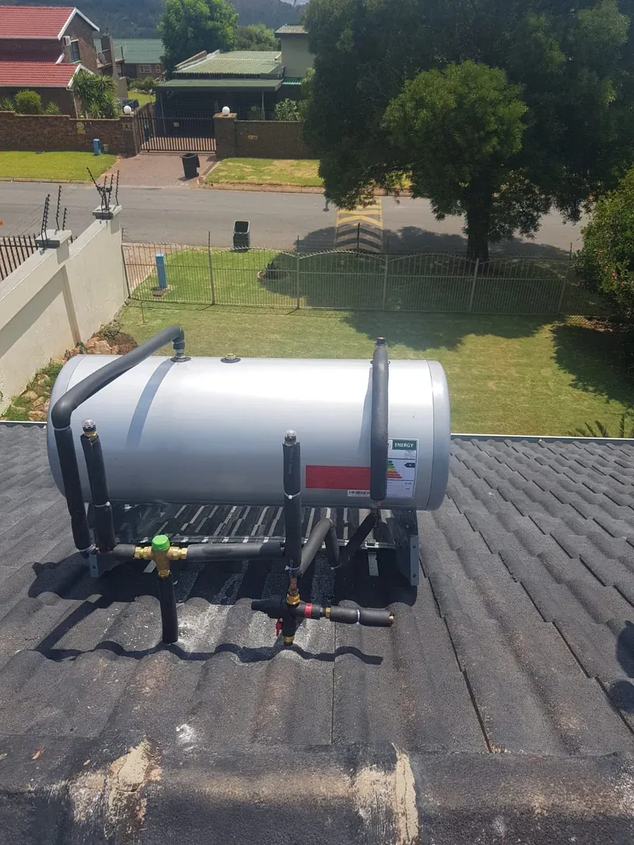 100 Litre Evacuated Tube Solar Geyser Conversion – Why Choose a 100 Litre Solar Geyser Conversion 100 litre solar geyser conversion installed on a tiled roof with insulated pipework